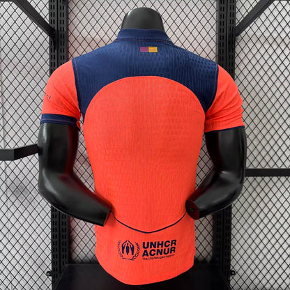 ברצלונה 25/26 – חולצת חוץ שנייה בכתום נייבי עוצמתי